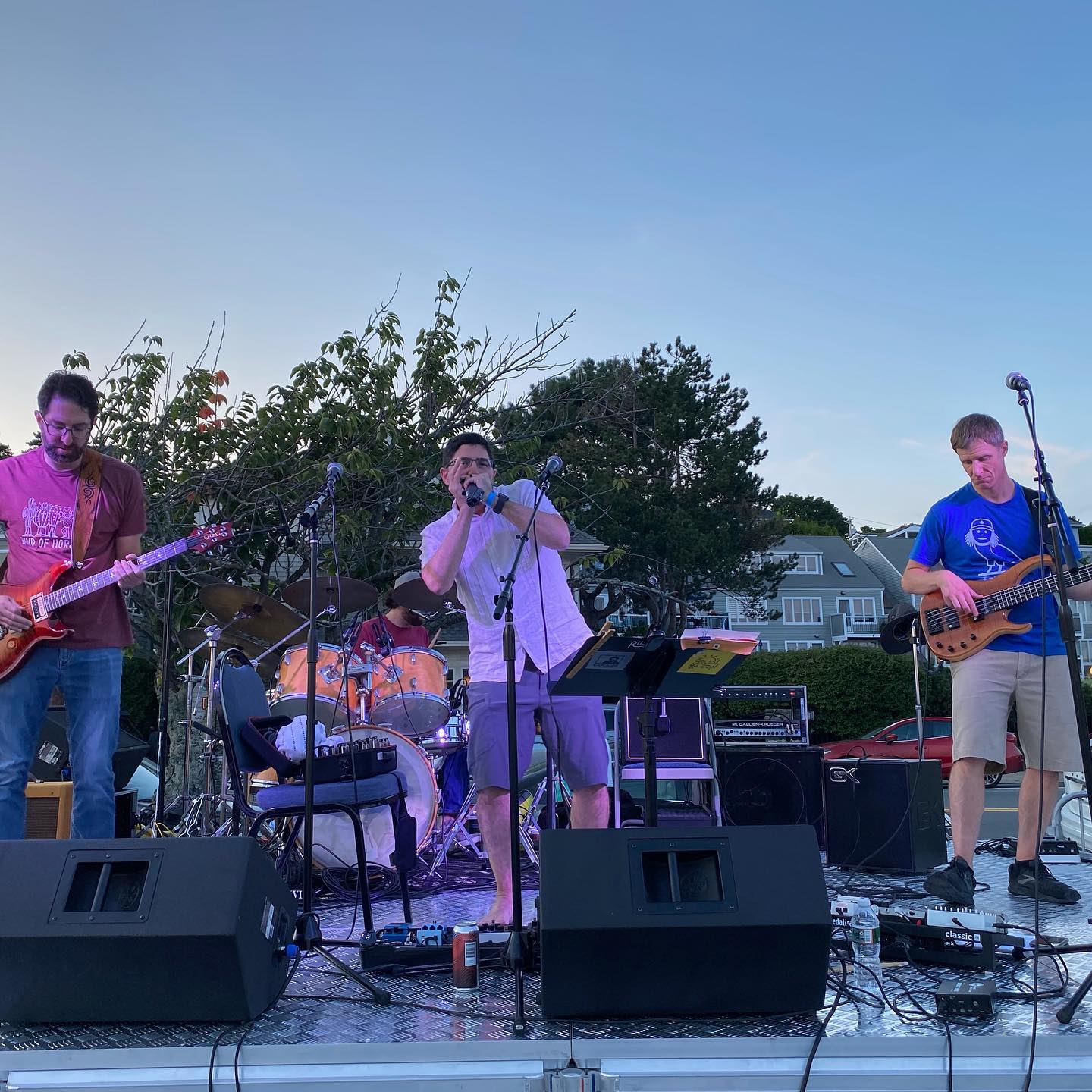 Birdface on stage at an outdoor show