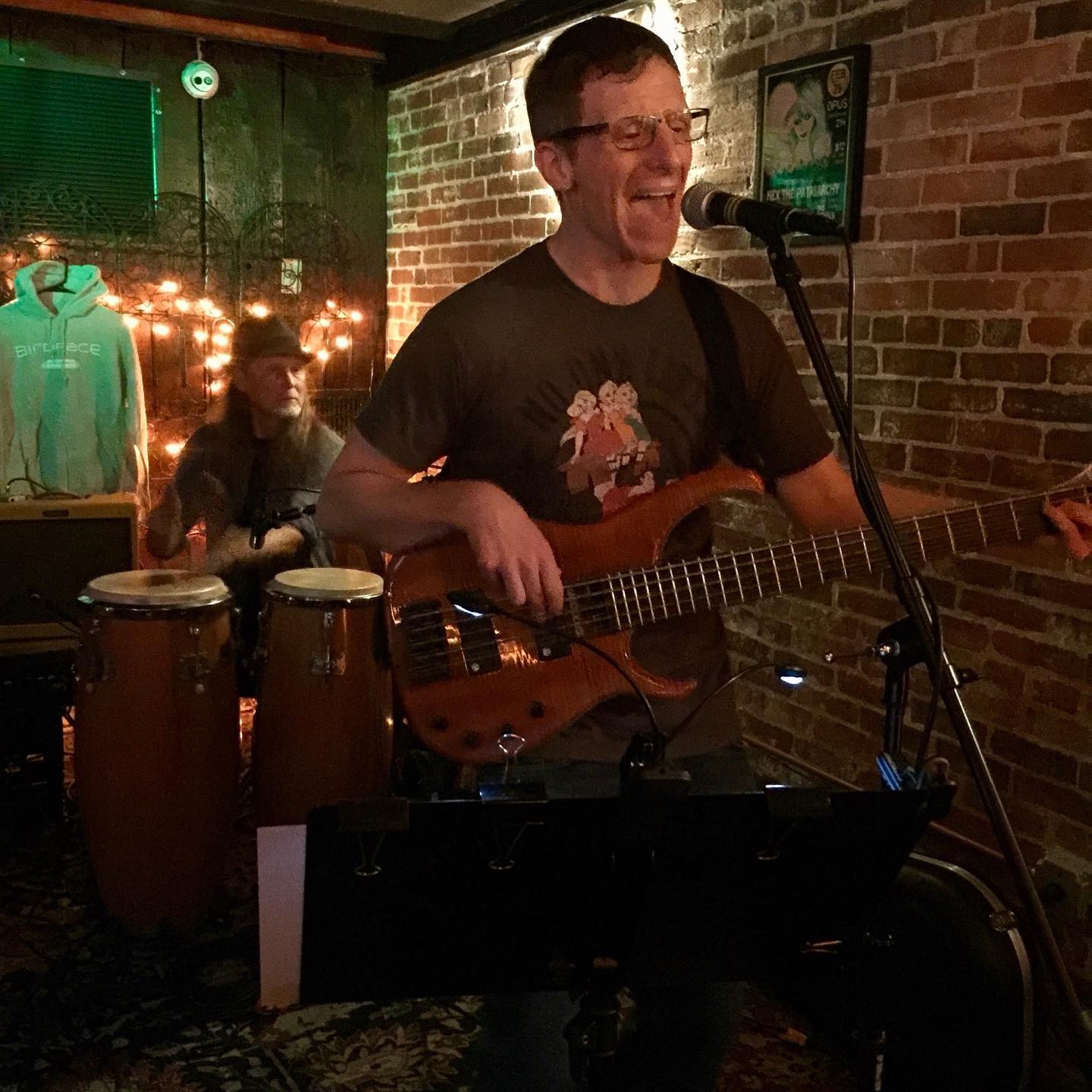 Michael Cucchi playing harmonica at House of Blues Boston
